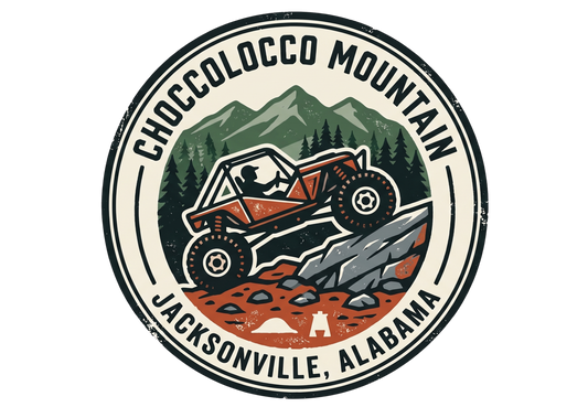 Vintage circular logo for Choccolocco Mountain in Jacksonville, Alabama, featuring an off-road rock buggy climbing a rugged limestone mountain trail surrounded by green pine trees.