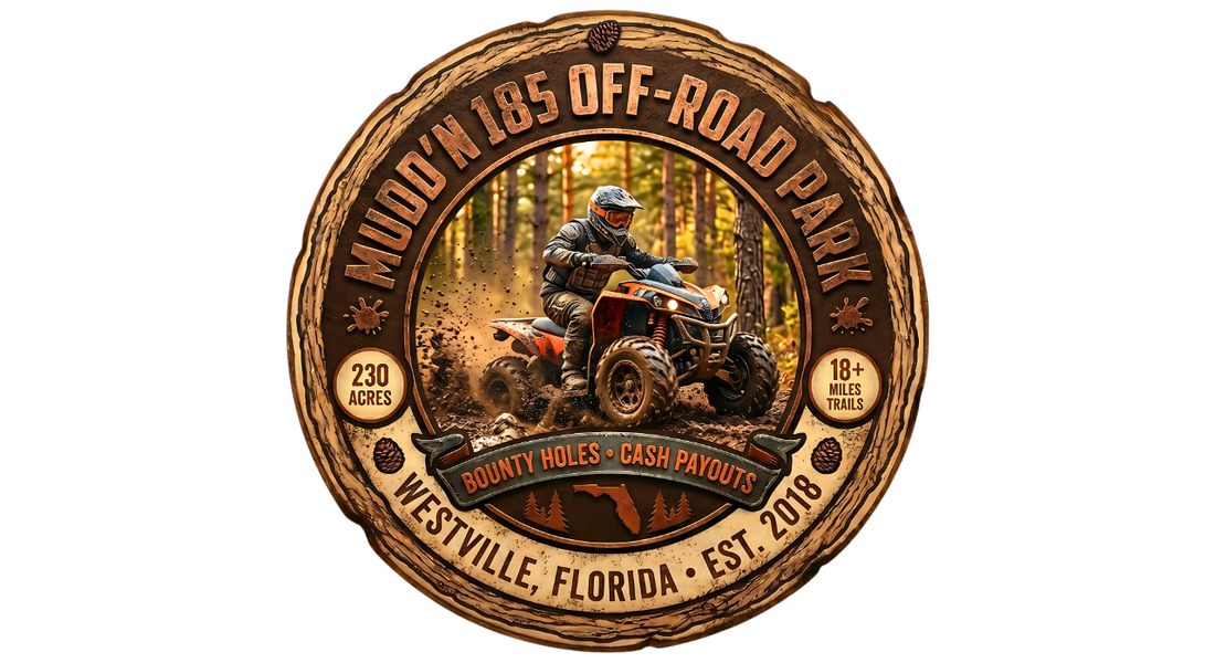Rustic wood emblem for Mudd'n 185 Off-Road Park in Westville, Florida, featuring an orange ATV kicking up dirt on a pine-lined trail. The badge highlights 230 acres, 18+ miles of trails, bounty holes, and cash payouts.