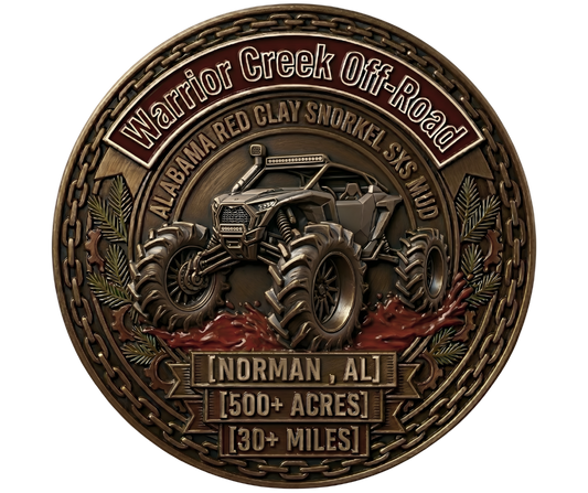 Official seal for Warrior Creek Off-Road in Warrior, AL. Brushed brass badge featuring a custom lifted SxS on 50-inch mud tires slinging Alabama red clay. Specs: 500+ acres, 30+ trail miles, Party in the Pines home base.