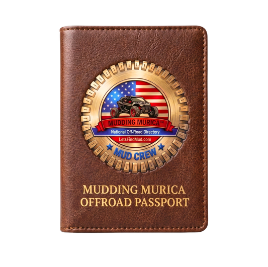 "Front view of the brown leather Mudding Murica Offroad Passport book standing straight, featuring the circular Mud Crew National Off-Road Directory emblem logo and gold embossed title text."